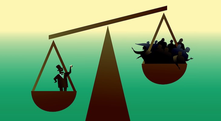 Scale weighing finance against people